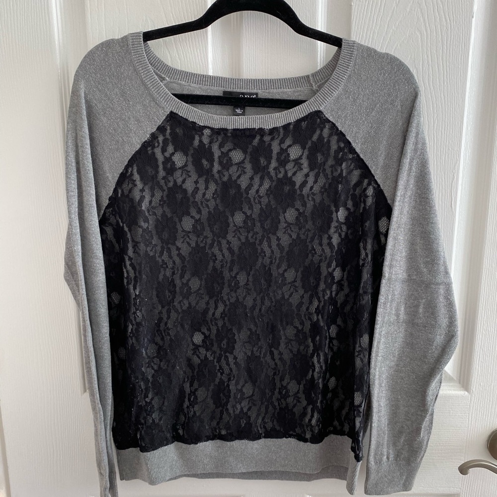 Women’s gray sweater with black lace detail